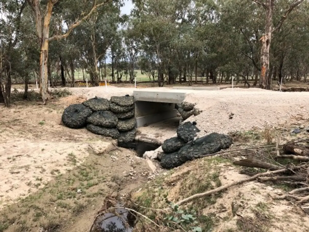 Culvert outfall protected with rock bags
