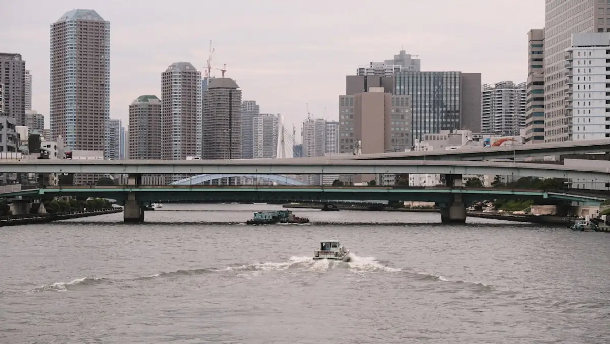 Highway bridge over river with rock bags placed at piers