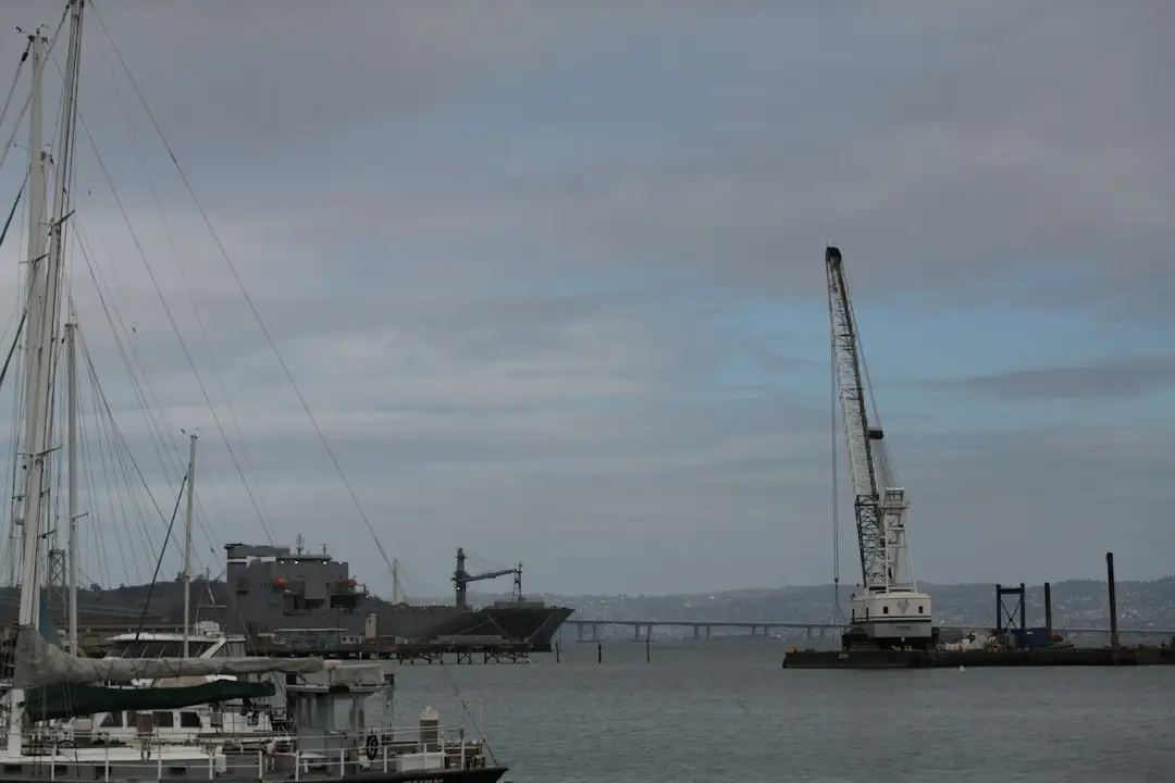 Contractor crew filling a 4-Ton Texas Tuff Rock Bag in a production frame with an excavator.