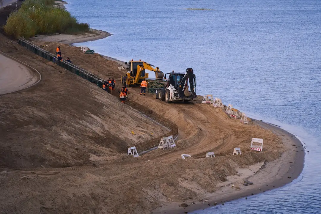 4-Ton Texas Tuff Rock Bags armoring a highway embankment in a stair-stepped layout to control fill-slope erosion